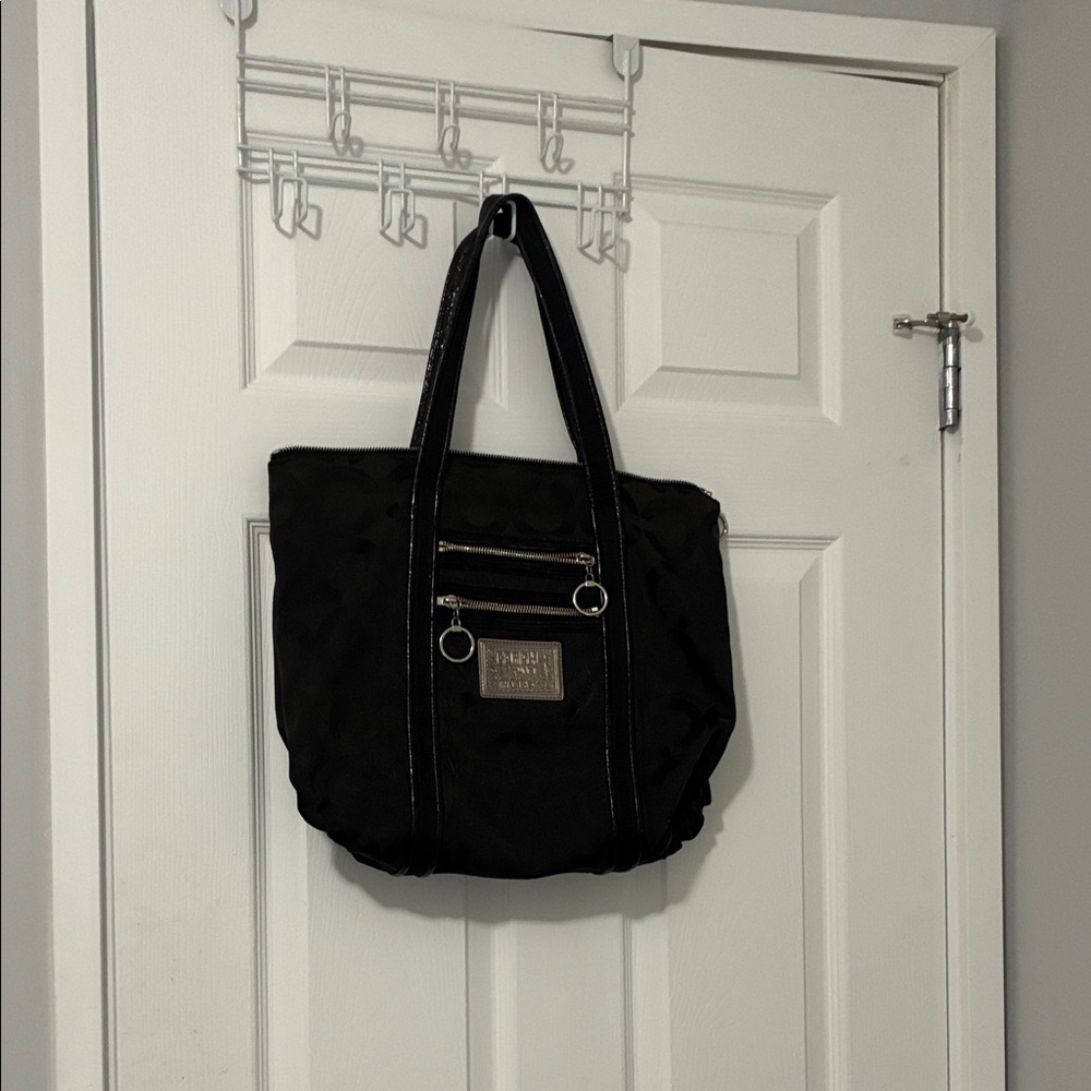 Coach black cloth handbag purse with 2 outside zippered pockets